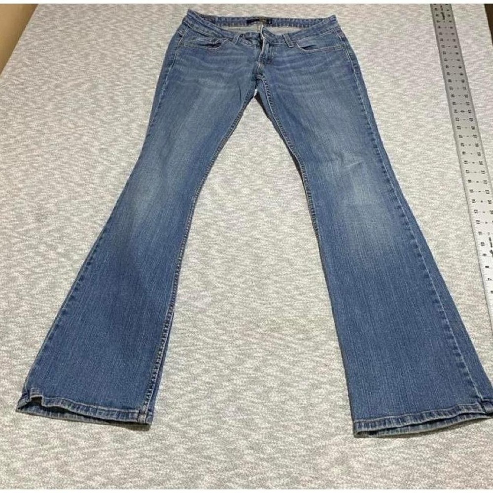 Levi's blue denim jeans flared leg too super low women 7 long. SKU-B720